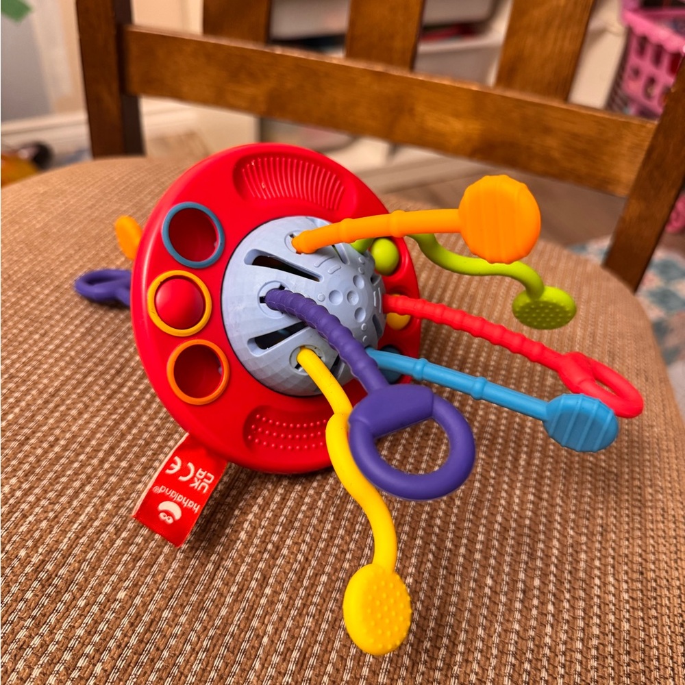 3/ $20. Montessori Silicone Pull String Activity Toy